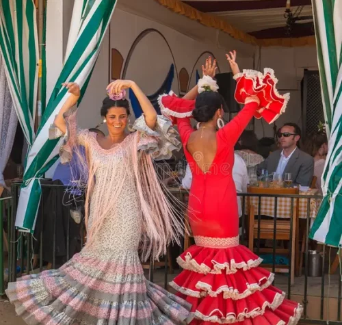 Trajes de flamenco en clase de sevillanas
